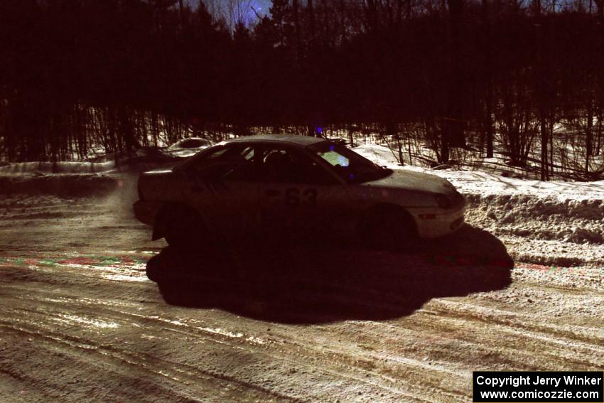 Mark Lapid / Mike Busalacchi Dodge Neon goes wide on a slippery right-hander on a stage after the lunch break.