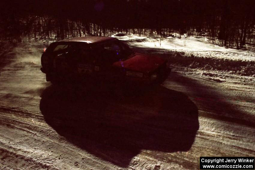 Brian Vinson / Richard Beels VW GTI drifts through a slippery right-hander on the stage after the lunch break.