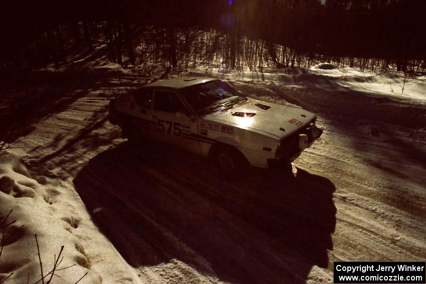 Jeremy Butts / Peter Jacobs Plymouth Arrow takes a conservative line through a slippery right-hander on the stage after lunch.