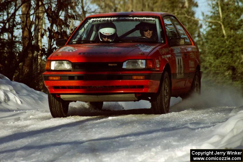 Gail Truess / Pattie Hughes at speed in their Mazda 323GTX before sundown.