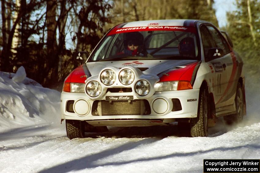 Garen Shrader / Doc Shrader at speed before sundown in their Mitsubishi Lancer Evo IV.