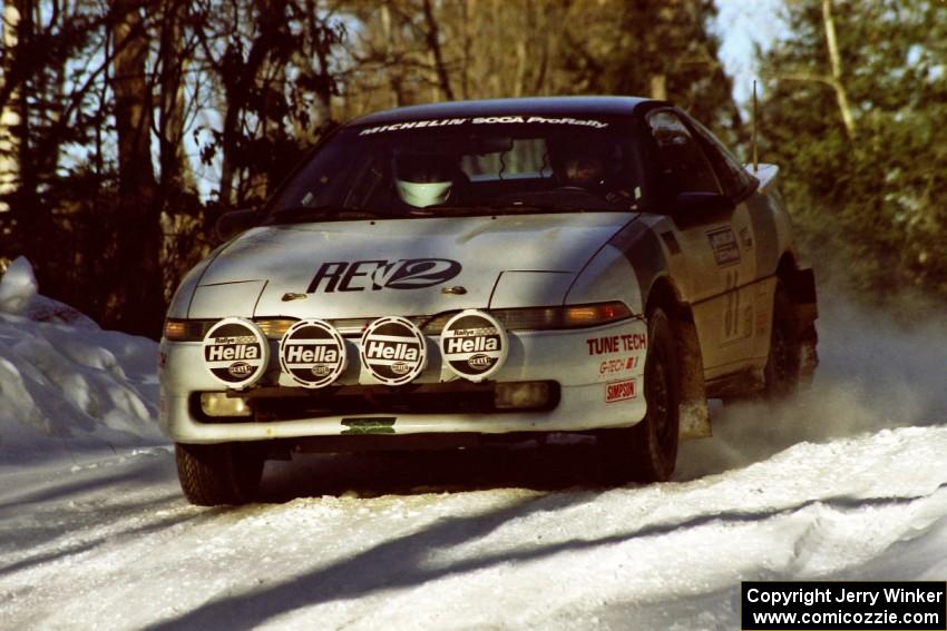 Rob Bohn / Todd Houtz Mitsubishi Eclipse at speed over a blind crest before sunset.