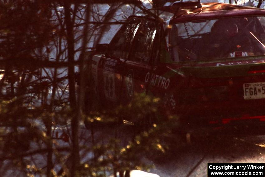 Carlos Arrieta, Sr. / Dick Casey Audi 4000 Quattro head downhill after a crest before sundown.