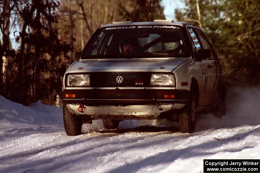 Art Burmeister / Randy Moore VW GTI at speed over a crest before sunset.