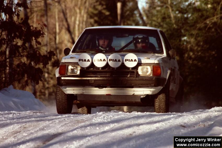 John Zoerner / Greg Reno Dodge Omni GLH-Turbo comes over a crest before sundown.