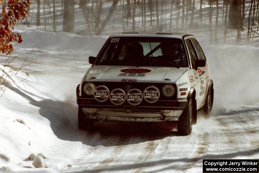 Doug Davenport / Al Kintigh VW Golf take a clean inside line at a right-hander on SS3.