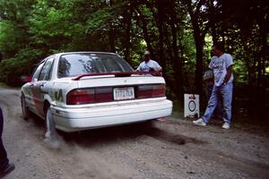 Arthur Wojcik / Chuck Cox Mitsubishi Galant VR-4 leaves the start of the practice stage.