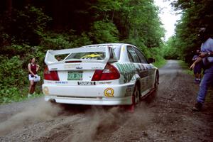 Gabriel Marin-Ortiz / Mark Williams Mitsubishi Lancer Evo V leaves the start of the practice stage.