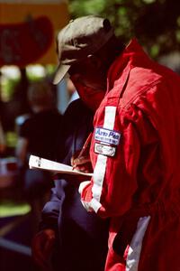 Arthur Odero-Jowi signs an autograph at the green in Wellsboro before the rally.