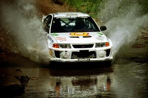 Gabriel Marin-Ortiz / Mark Williams Mitsubishi Lancer Evo V at the finish of SS1, Stony Crossing.