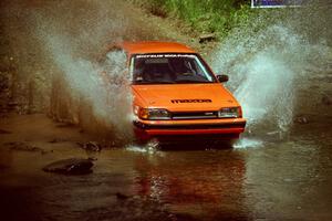 Gail Truess / Pattie Hughes Mazda 323GTX at the finish of SS1, Stony Crossing.