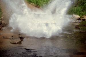 Ivan Orisek / Olga Orisek Audi 4000 Quattro at the finish of SS1, Stony Crossing.