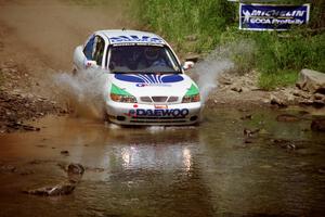 Peter Malaszuk / Darek Szerejko Daewoo Nubira at the finish of SS1, Stony Crossing.