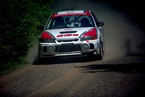 Garen Shrader / Doc Schrader Mitsubishi Lancer Evo IV at speed on SS4, Cedar Run.