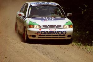 Peter Malaszuk / Darek Szerejko Daewoo Nubira at speed on SS4, Cedar Run.