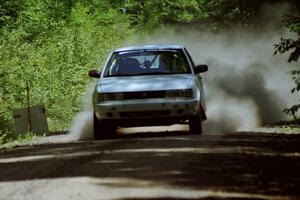 Ted Mendham / Lise Mendham Nissan Sentra SE-R crosses the finish of of SS4, Cedar Run.