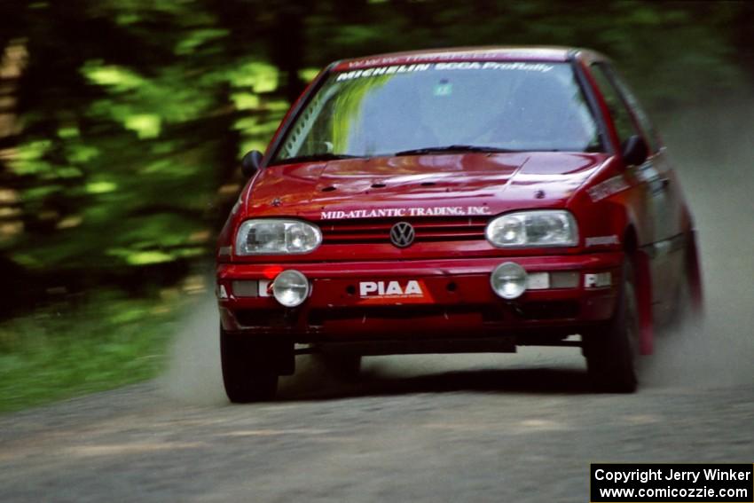 Chris Havas / Eric Tremblay VW Golf at speed on the practice stage.