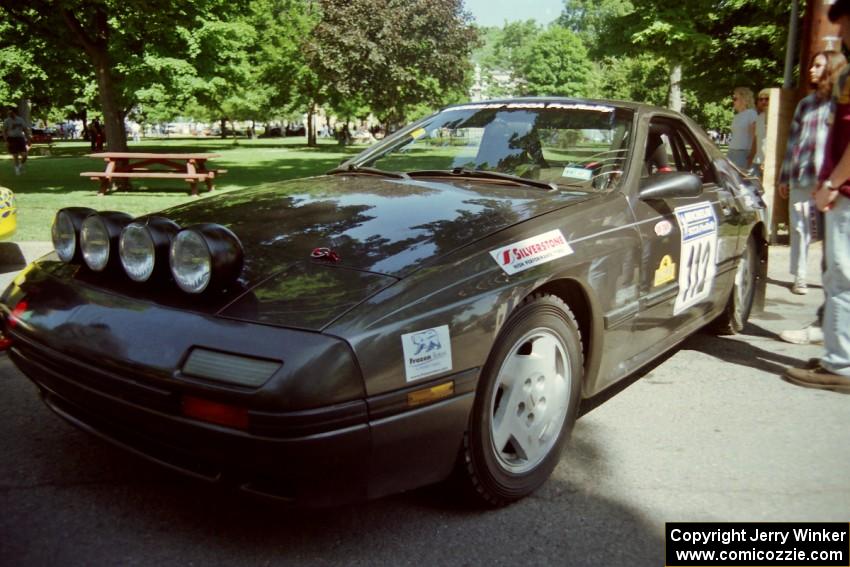 Jens Larsen / Claire Chizma Mazda RX-7 at the green in Wellsboro before the rally.