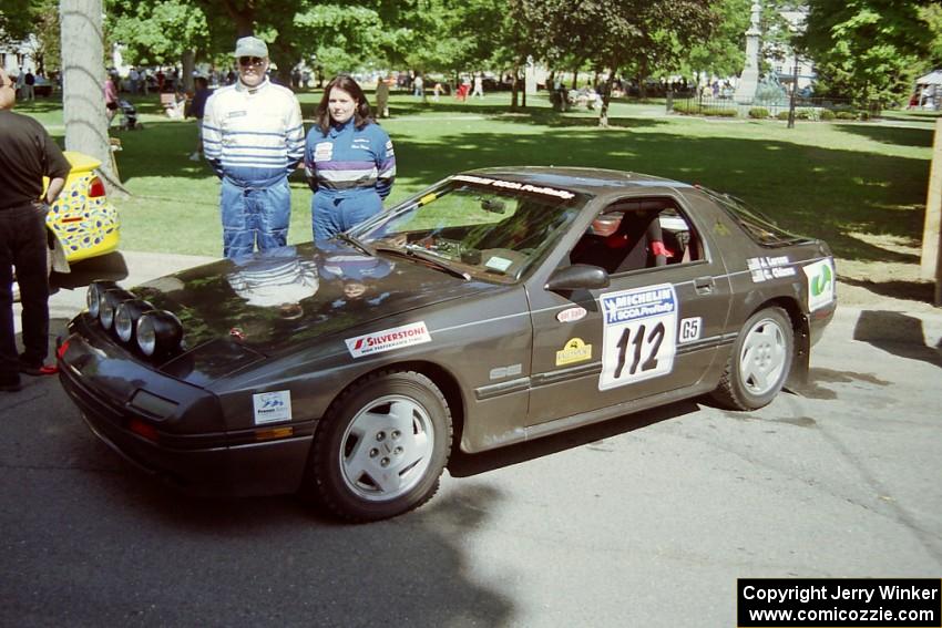 Jens Larsen / Claire Chizma Mazda RX-7 at the green in Wellsboro before the rally.