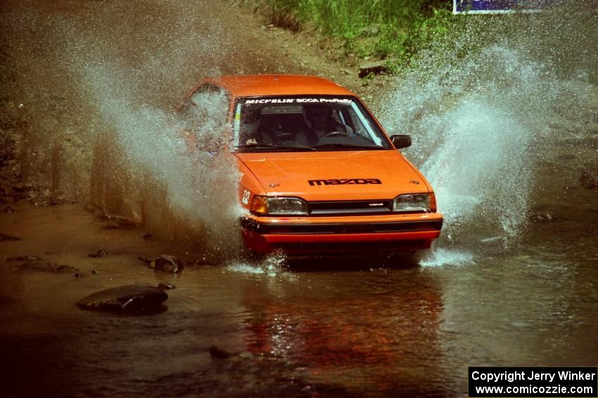 Gail Truess / Pattie Hughes Mazda 323GTX at the finish of SS1, Stony Crossing.