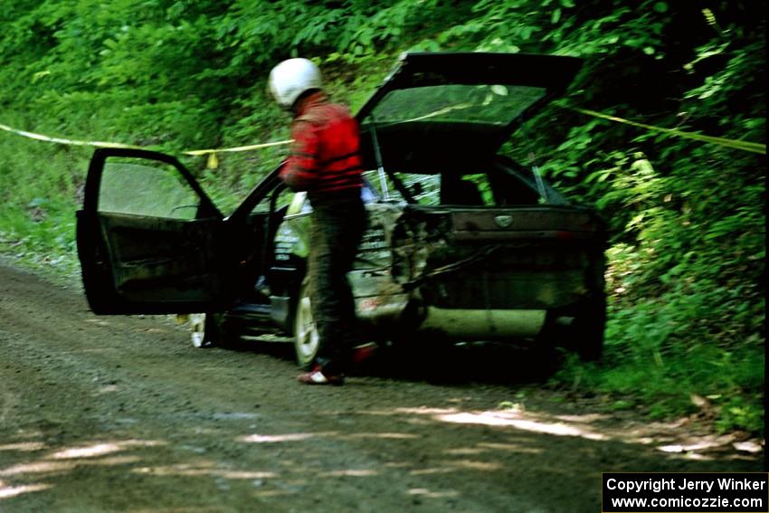 Celsus Donnelly / Kevin Mullan Eagle Talon looks at his flat just past the FTC of SS1, Stony Crossing.