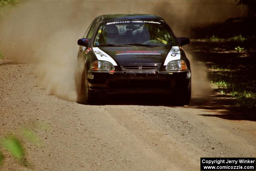 Jay Kowalik / Scott Embree Honda Civic CVT at speed on SS4, Cedar Run.