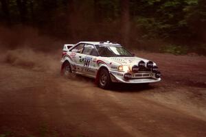 Frank Sprongl / Dan Sprongl Audi S2 Quattro powers out of a hairpin on SS5, Thompson Point I.