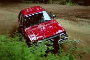 Jon Kemp / Rod Hendricksen Audi 4000 Quattro powers out of a hairpin on SS5, Thompson Point I.