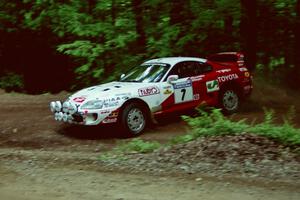 Ralph Kosmides / Joe Noyes Toyota Supra Turbo slides into a hairpin on SS5, Thompson Point I.