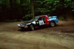 Cal Landau / Eric Marcus Mitsubishi Eclipse GSX slides into a hairpin on SS5, Thompson Point I.