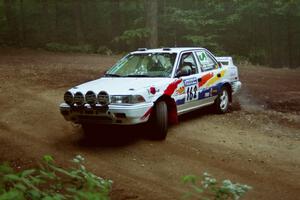 Keith Townsend / Jennifer Cote Toyota Corolla at a hairpin on SS5, Thompson Point I.