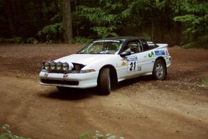 Chris Czyzio / Eric Carlson Mitsubishi Eclipse GSX at a hairpin on SS5, Thompson Point I.