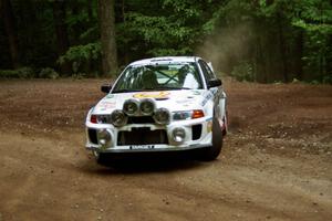 Gabriel Marin-Ortiz / Mark Williams Mitsubishi Lancer Evo V at a hairpin on SS5, Thompson Point I.