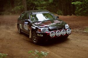 Bryan Hourt / Pete Cardimen Honda Civic powers out of a hairpin on SS5, Thompson Point I.