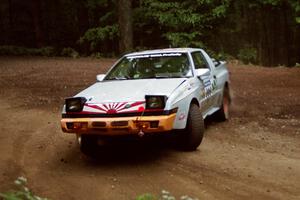 Mark Bowers / Duffy Bowers Mitsubishi Starion powers out of a hairpin on SS5, Thompson Point I.