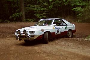 Lesley Suddard / Marc Goldfarb  Dodge Shelby Charger at a hairpin on SS5, Thompson Point I.