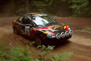 Evan Moen / Tom Young  Plymouth Neon ACR powers out of a hairpin on SS5, Thompson Point I.