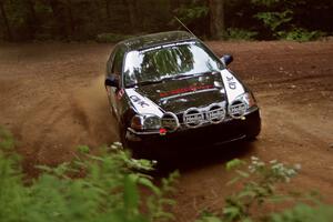 Jay Kowalik / Scott Embree Honda Civic CVT powers out of a hairpin on SS5, Thompson Point I.