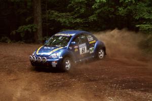 Karl Scheible / Gail McGuire VW Beetle slides into a hairpin on SS5, Thompson Point I.