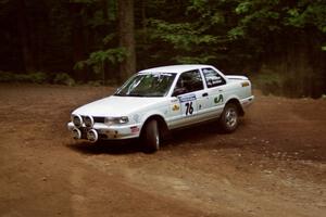 Ted Mendham / Lise Mendham Nissan Sentra SE-R slides into a hairpin on SS5, Thompson Point I.