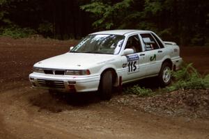 Seamus Burke / Rob Walden Mitsubishi Galant VR-4 at a hairpin on SS5, Thompson Point I.