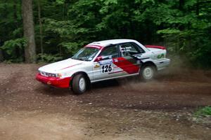 Arthur Wojcik / Chuck Cox Mitsubishi Galant VR-4 powers out of a hairpin on SS5, Thompson Point I.