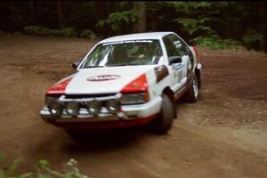 James Frandsen / Todd Bourdette Audi 200 Quattro powers out of a hairpin on SS5, Thompson Point I.