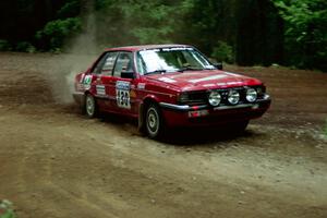 Jim Kuhn / Jennifer Logel Audi 4000 Quattro powers out of a hairpin on SS5, Thompson Point I.