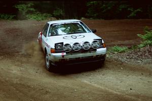 Jason Williams / Jeff Williams Toyota Celica powers out of a hairpin on SS5, Thompson Point I.