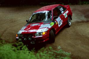 Ken Kovach / Mark Rinkel Ford Escort GT powers out of a hairpin on SS5, Thompson Point I.