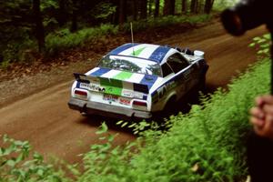 John Shirley / Phil Barnes Triumph TR-7 powers out of a hairpin on SS5, Thompson Point I.