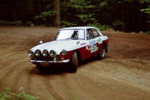 Phil Smith / Dallas Smith MGB-GT powers out of a hairpin on SS5, Thompson Point I.