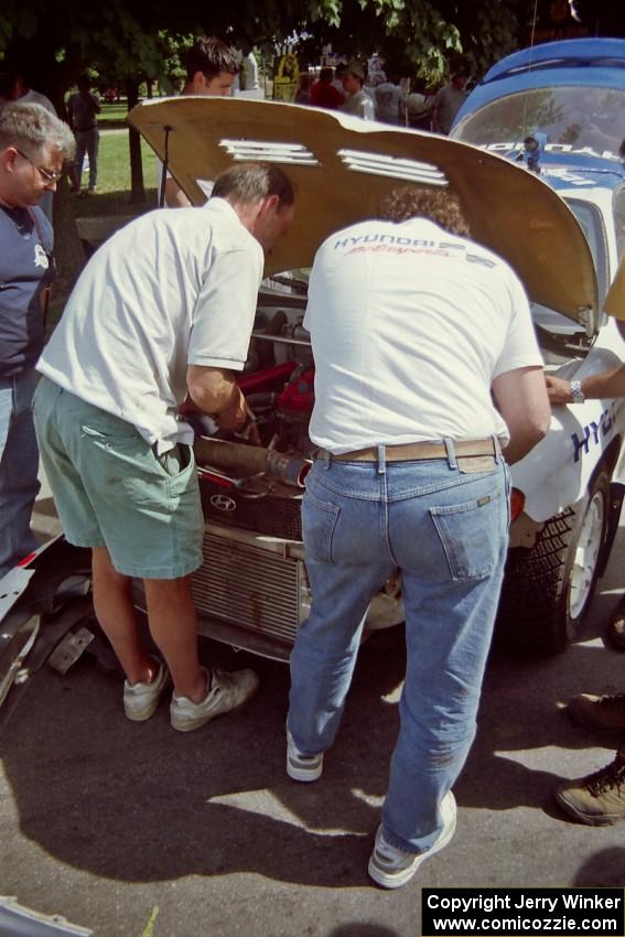 Paul Choiniere / Jeff Becker Hyundai Tiburon gets serviced during the midday break on the green in Wellsboro.