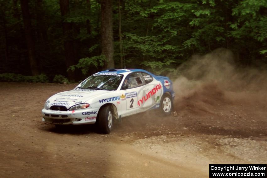 Noel Lawler / Charles Bradley Hyundai Tiburon slides into a hairpin on SS5, Thompson Point I.